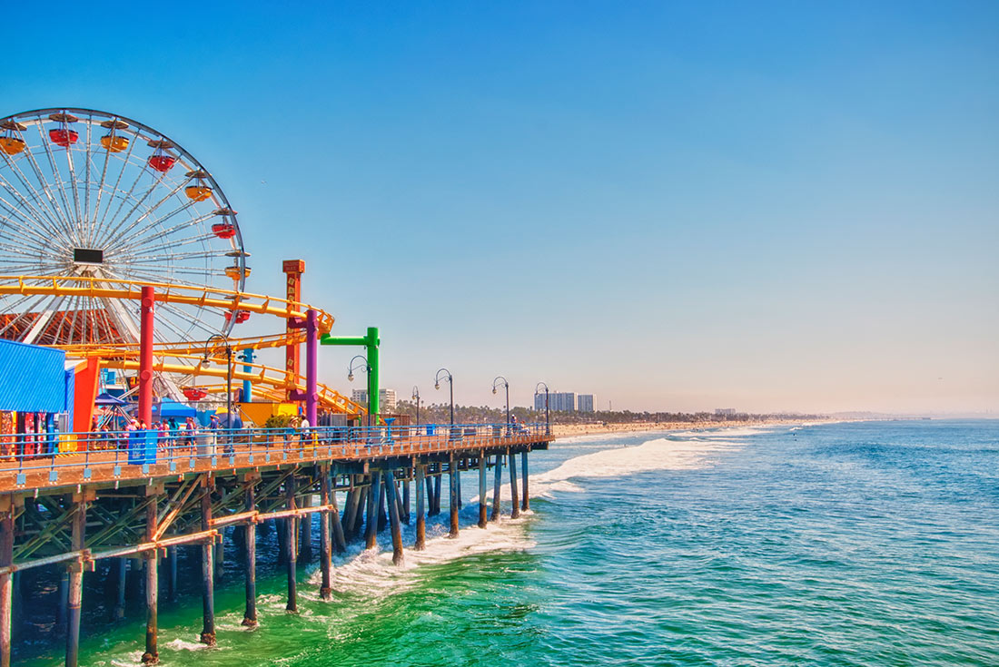 A view of a Ferris wheel on the Santa Monica Pier in Los Angeles, USA